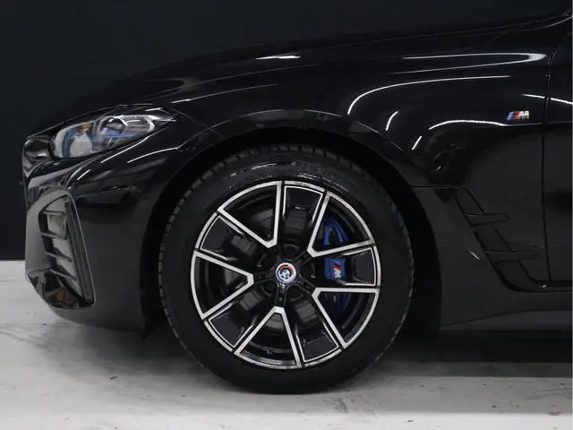 BMW i4 M50 High Executive 84 kWh [SOH 95%, SCHUIFKANTELDAK, HARMAN/KARDON, APPLE CARPLAY, ANDROID, C...