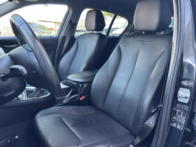 BMW 1-serie 114i EDE | Stoelverwarming | Leder | Bluetooth | Navi | Cruise