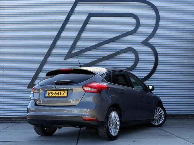 Ford Focus 1.0 Titanium Edition 2e Eigenaar|Navi|Clima|Cruise|PDC V+A|LM Velgen|N.A.P|APK tot 05-202...