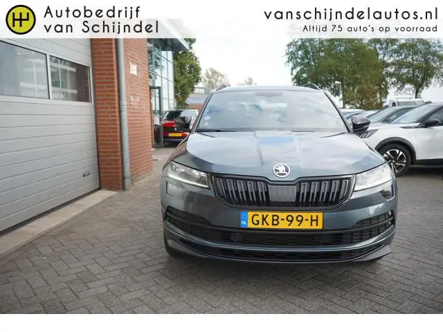ŠKODA Karoq 1.5 TSI ACT 150PK SPORTLINE BUSINESS VOL LUXE PANORAMADAK ZWARTE HEMEL CAMERA STOEL+STUU...