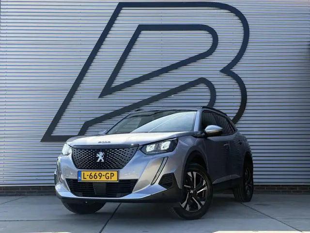 Peugeot 2008 1.2 PureTech Blue Lease Allure 2e Eigenaar|Navi|Camera|D-riem v.v. in 2026|Clima|Cruise...