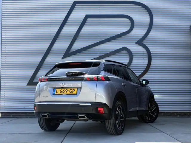 Peugeot 2008 1.2 PureTech Blue Lease Allure 2e Eigenaar|Navi|Camera|D-riem v.v. in 2026|Clima|Cruise...