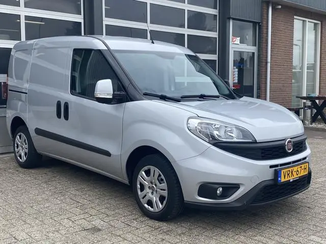 Fiat Doblò Cargo 1.3 MJ L1H1 SX Marge Btw en Bpm vrij Airco Cruise controle Navigatie Tussenschot Pa...