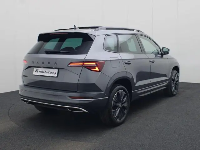 Skoda Karoq 1.5 TSI 150PK ACT Sportline DSG · Panoramadak · CANTON Audio · 360°Camera + Parkeersenso...