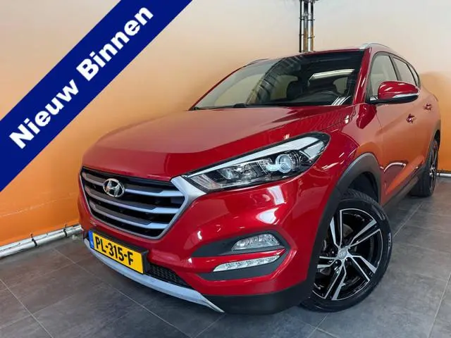 Hyundai Tucson 1.6 GDi Anniversary Edition leer | navi | trekhaak | cruise control camera | 4x all s...