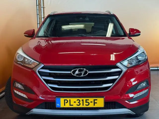 Hyundai Tucson 1.6 GDi Anniversary Edition leer | navi | trekhaak | cruise control camera | 4x all s...