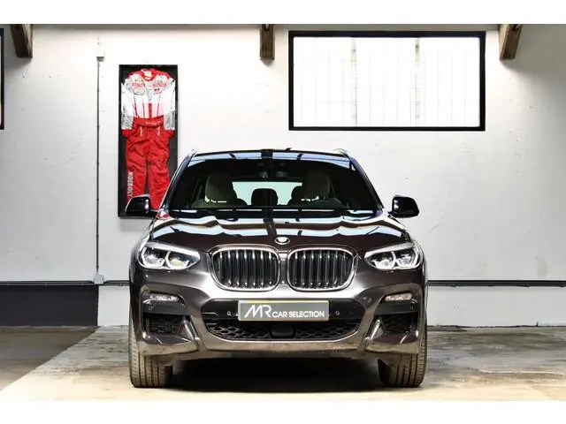 BMW X3 xDrive20i High Executive M Sport | HUD | 21" | Adap. cruise | Trekhaak | Dealer onderhouden