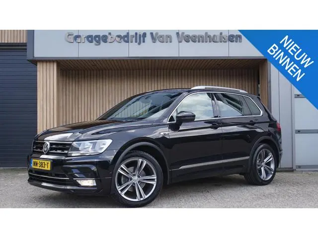 Volkswagen Tiguan 1.4 TSI 125PK 2x R-Line Navi 19inch LM Trekhaak Cruise Control *NL auto* 105457km!