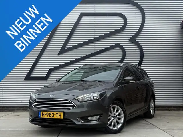 Ford Focus Wagon 1.0 Titanium 1e Eigenaar|Navi|Clima|Cruise|Carplay|Stoel+Stuur verw|PDC V+A|APK tot...