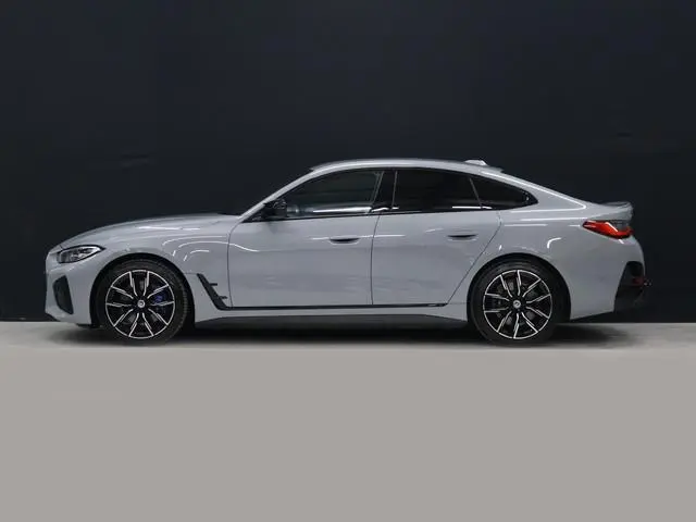 BMW i4 M50 High Executive 84 kWh [SOH 95%, TREKHAAK, APPLE CARPLAY, HEAD-UP DISPLAY, STOELVERWARMING...