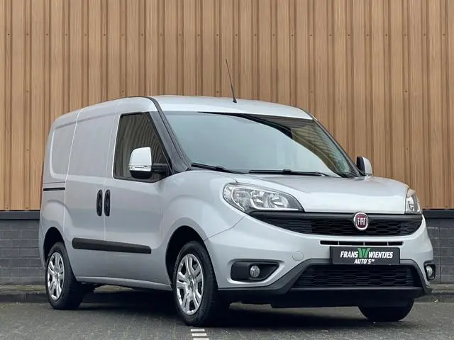 Fiat Doblò 1.3 MJ L1 | Marge! | Trekhaak | Navigatie | Airconditioning | Cruise Control | Bluetooth...