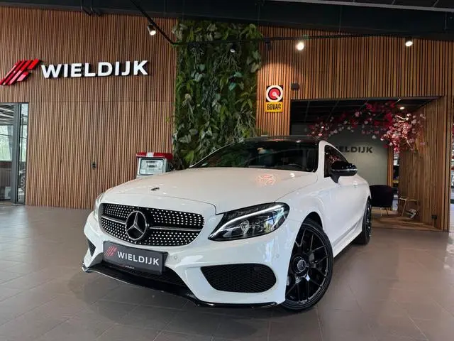 Mercedes-Benz C-klasse Coupé 180 Premium Plus Panorama Schuifdak nieuwe velgen en banden