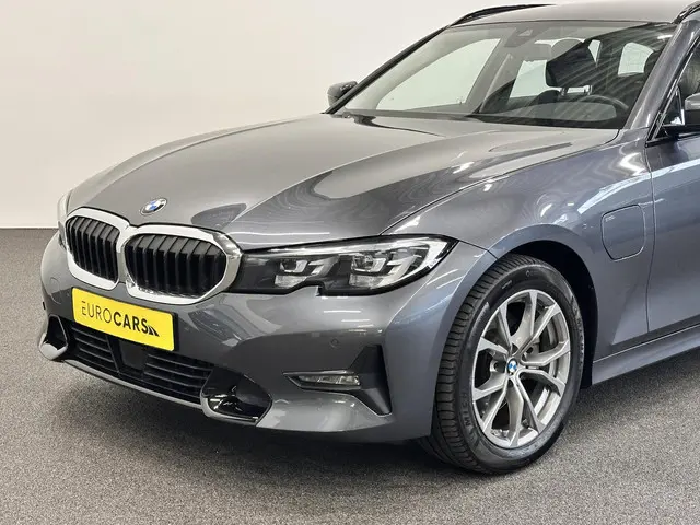 BMW 3-serie Touring 320e Aut. Sportline 204pk Airco ECC Navi Carplay PDC VA Adaptive Cruise Control...