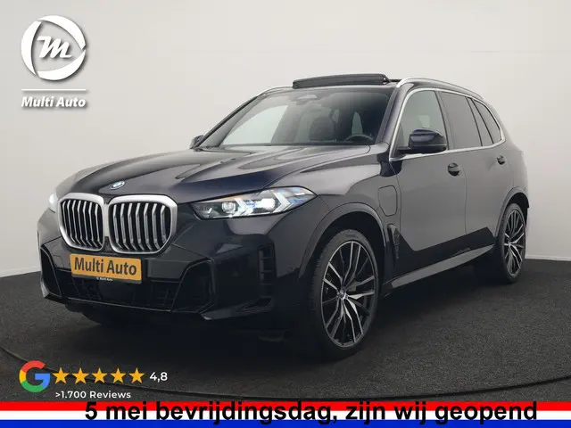 BMW X5 xDrive50e M Sport PHEV 490pk Dealer O.H. | Panodak Sky Lounge | Luchtvering | Head Up | 360 C...