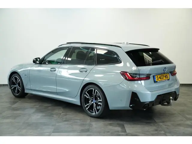 BMW 3-serie Touring 320e Panoramadak PDC ACC HI-FI M Sport Trekhaak 24 Maanden garantie* (Vraag naar...