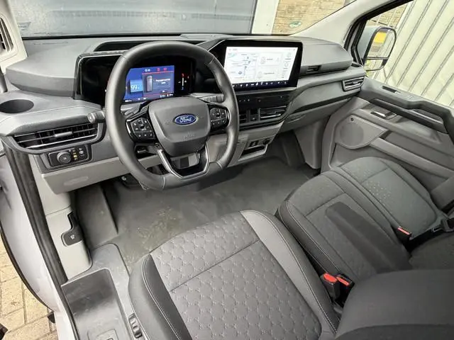 Ford E-Transit Cust. 320 L1H1 Limited 65 kWh/ 218 PK Direct leverbaar/stoel&stuur verwaming/B&O/ Cam...