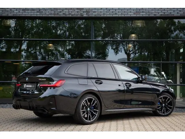 BMW 3-serie Touring M340i xDrive 374PK , Panoramadak, HUD, Adap. cruise, Laser, Memory