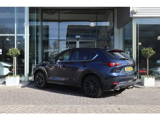 Mazda CX-5 2.0 e-SkyActiv-G M Hybrid 165 Homura Trekhaak / Bose / Camera / Head-Up / Leer / Navi / C...