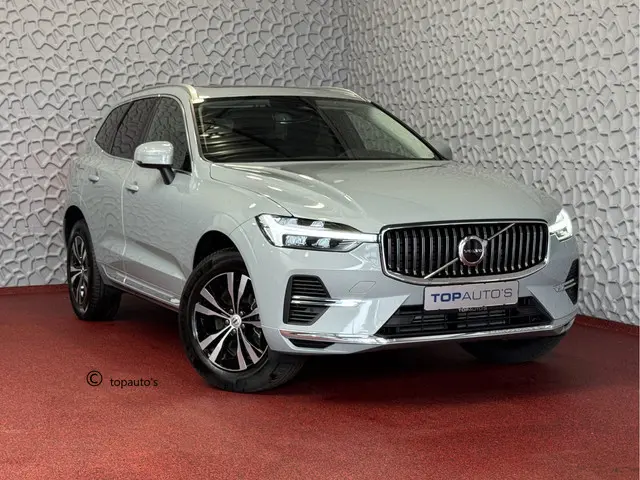 Volvo XC60 ✅NIEUWE AUTO✅ VAPOUR GREY 2.0 T6 350 PK PHEV LEER AWD PLUS BRIGHT LONG RANGE PANO PERF.AU...