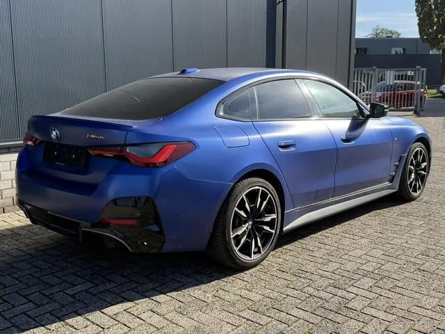 BMW i4 M50 High Executive 84 kWh 19"/Lederen M-stoelen + memory/Harman Kardon/Keyless/Camera/Adaptie...
