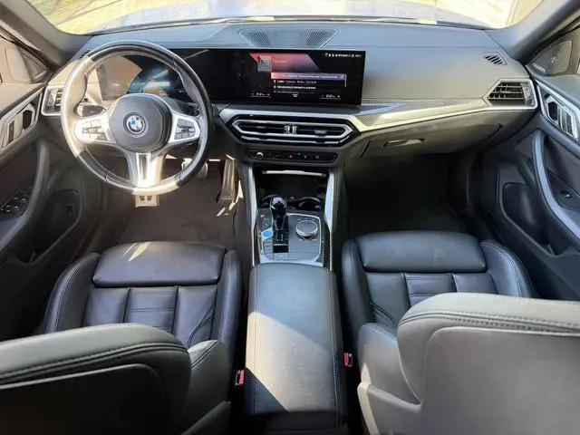 BMW i4 M50 High Executive 84 kWh 19"/Lederen M-stoelen + memory/Harman Kardon/Keyless/Camera/Adaptie...
