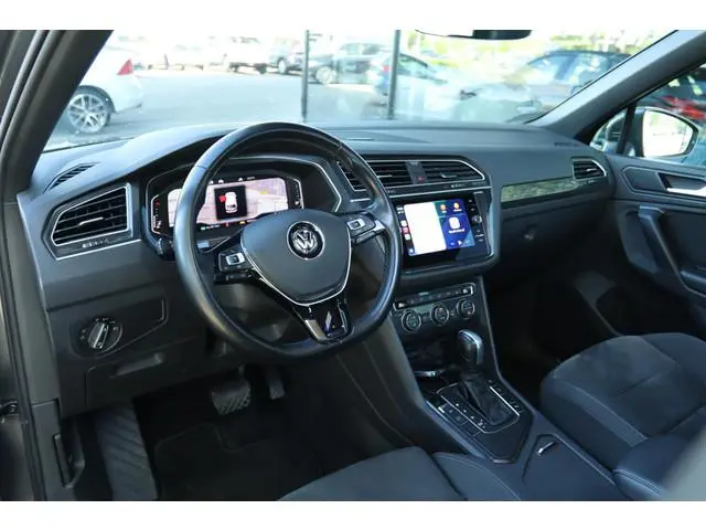 VOLKSWAGEN TIGUAN 1.5 TSI ACT AUT. R-LINE HIGHLINE BUSINESS | PANO | VIRT. COCKPIT | TREKHAAK | CARP...