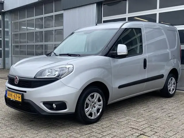 Fiat Doblò Cargo 1.3 MJ L1H1 SX Btw en Bpm vrij Airco Cruise controle Navigatie Tussenschot Parkeerh...
