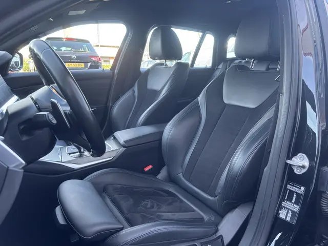 BMW 3-serie Touring 318i Business Edition | M Pakket | Sfeerverlichting | Apple Carplay | Parkeercam...