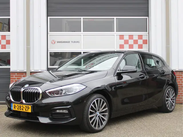 BMW 1-serie 118i Business+ Sport Automaat /Navigatie/Camera/Leder/Stoelverwarming/PDC/18'LM/LED/Lane...