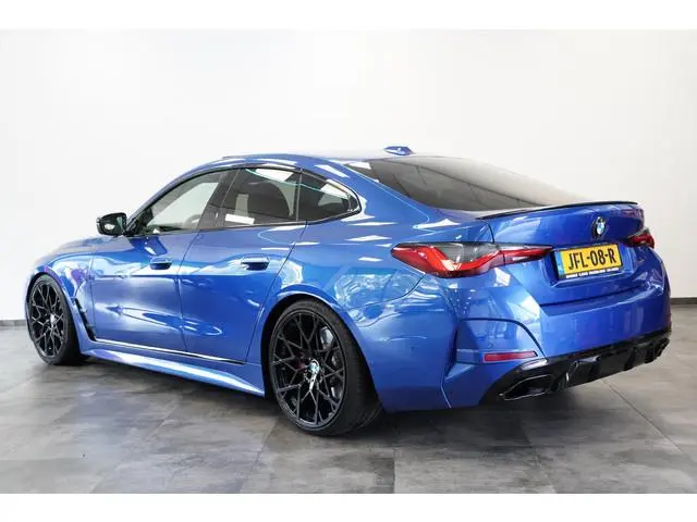 BMW 4-serie Gran Coupé M440i xDrive High Executive ACC Opendak Wide Screen Head-up H&K Trekhaak Carb...