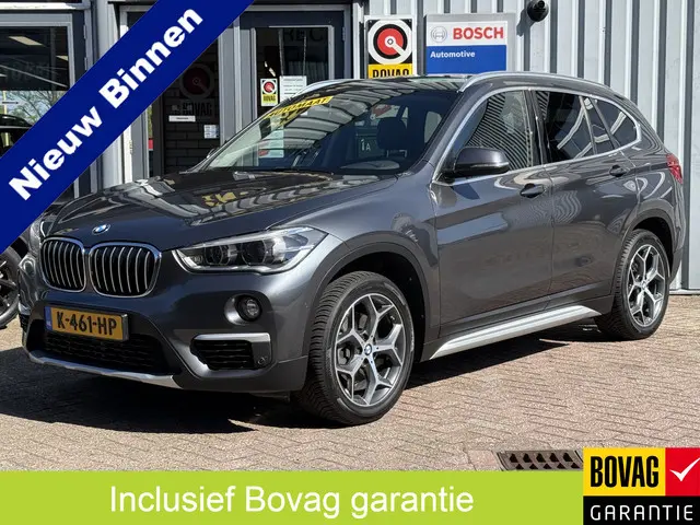 BMW X1 sDrive18i High Executive | AUTOMAAT | TREKHAAK | NAVI | ELEKTR KOFFERKLEP |