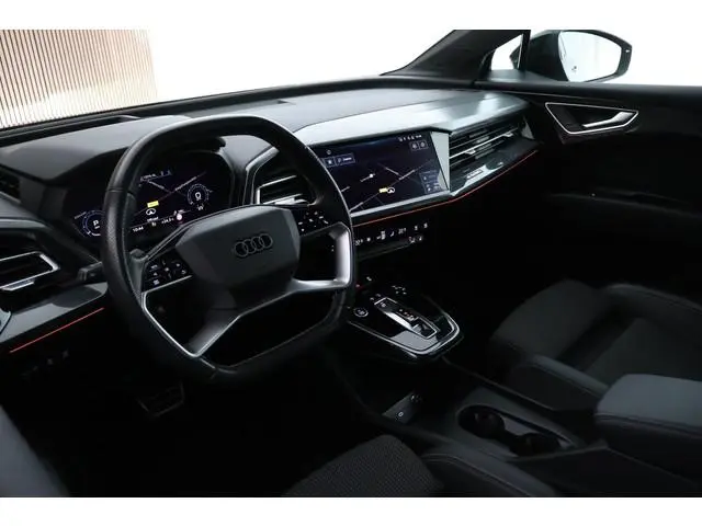 Audi Q4 Sportback e-tron 40 S edition 77 kWh SOH 93% Trekhaak Camera HUD Sonos Panoramadak Stoelverw...